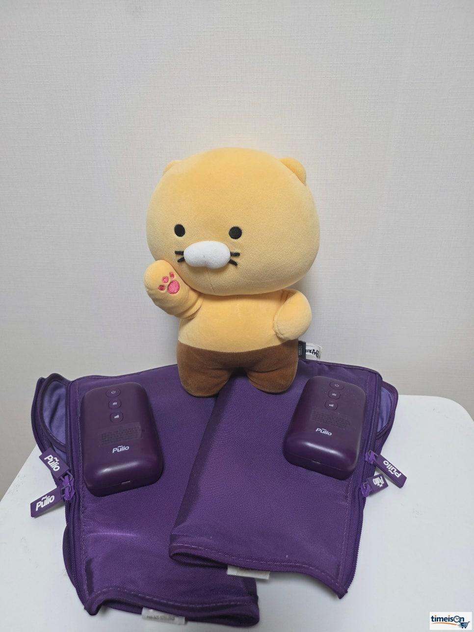 박스를 개봉한 직후의 풀리오 V3 종아리 마사지기 본체 및 구성품 실사